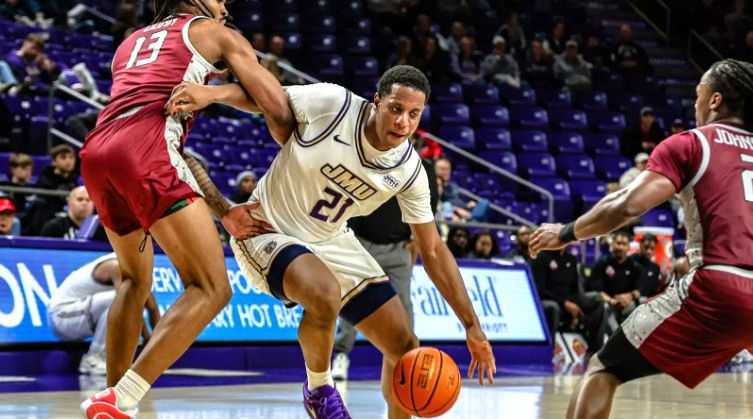 Kentucky signee Justin McBride (21) has played at Oklahoma State, Nevada and James Madison. (JMU Athletics Photo)