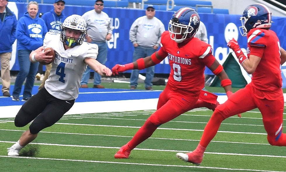 Daniel Thomas of Bell County High School runs past a couple of defenders from Christian Academy-Louisville during the 2023 Class 3A UK HealthCare Sports Medicine State Football Finals at Kroger Field. Thomas later was named Mr. Kentucky Football for 2023. (Photo by Wayne Mason)