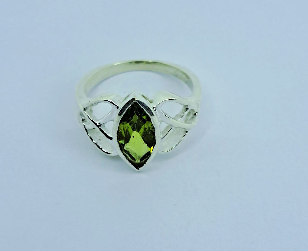 Rhodium Plated Sterling Silver Celtic Knot with Peridot Ring