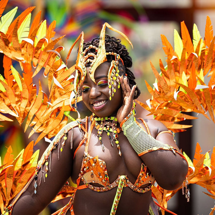 Saint Lucia Carnival Glam Hub. Here the makeup is perfectly matched to the masquerader's costume and skin.