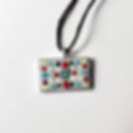 Teal and red mosaic pendant on rectangular silver base