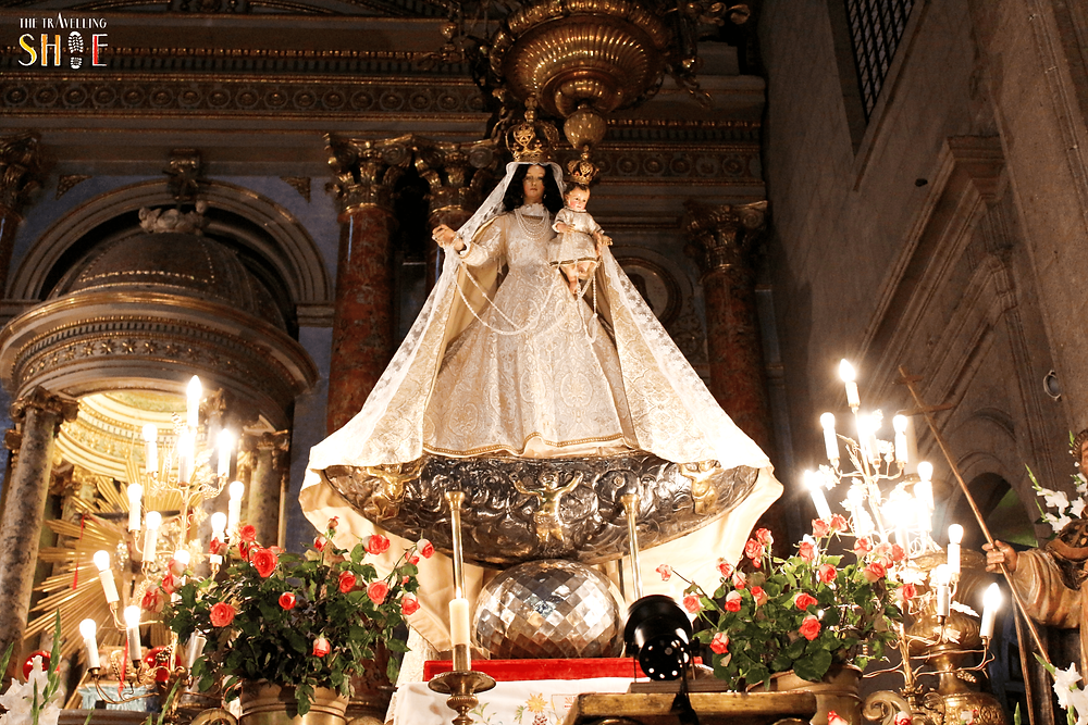 mother mary and jesus in mexico city church with candles
