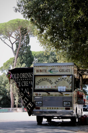 tiny Italian kiosk truck in a park