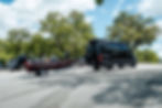 The-27North-Venture-X-luxury-travel-van-pulls-a-bass-fishing-boat-on-a-trailer.jpg