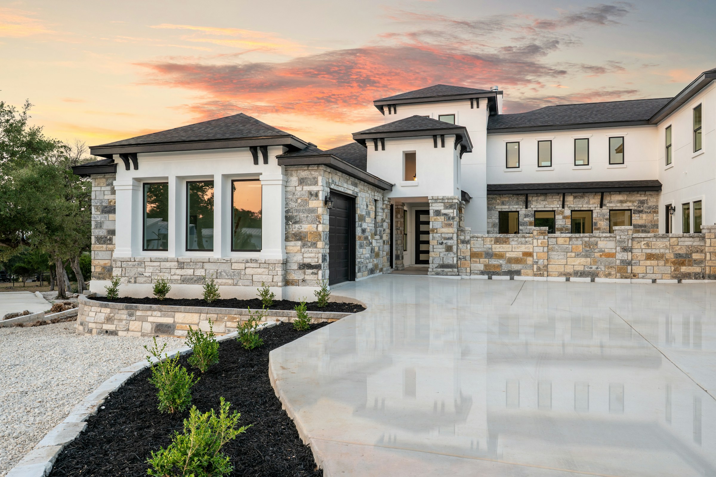 Modern luxury home prepared for sale at sunset
