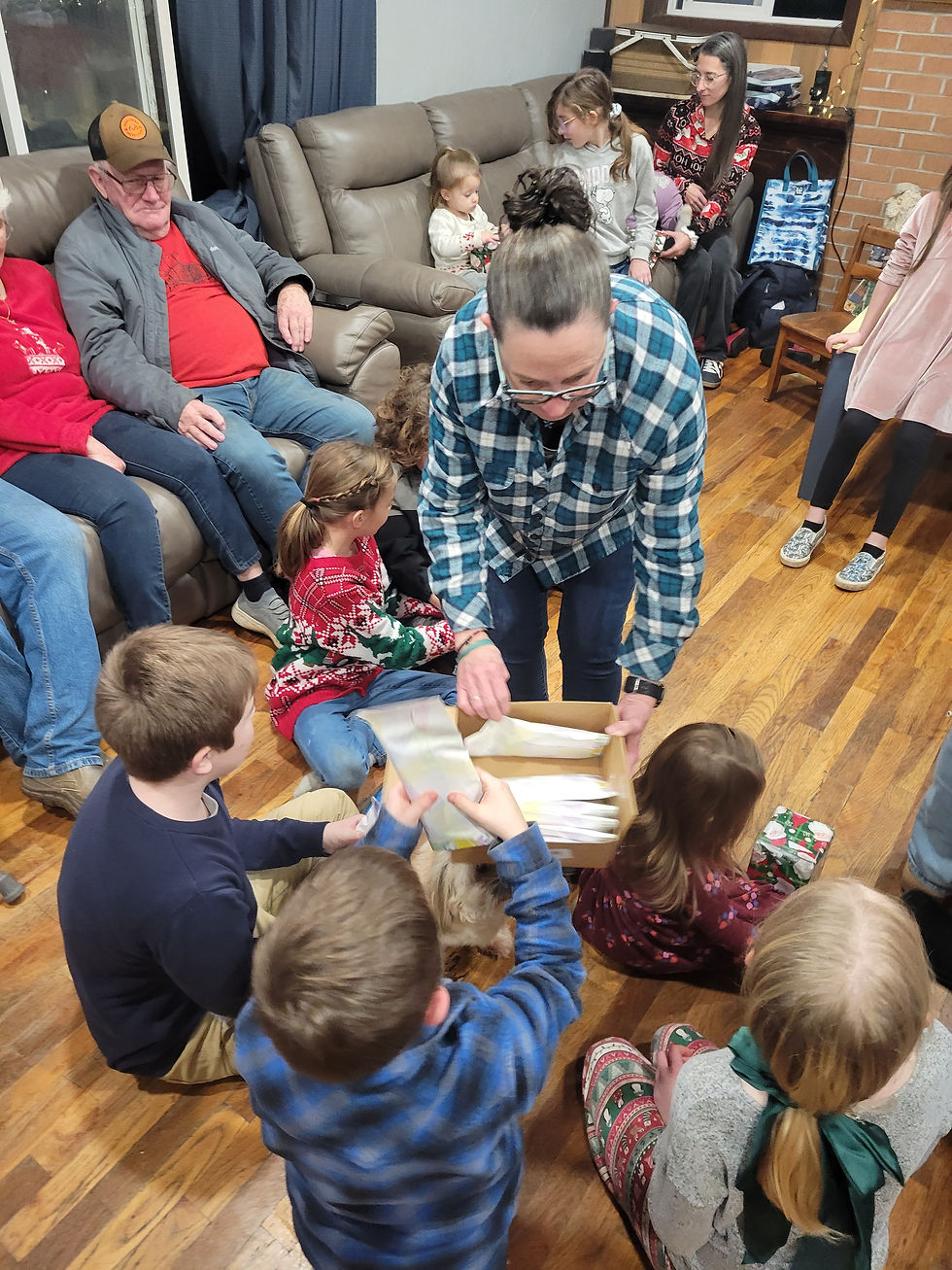 Tamieka Sapp passing out some of the gifts for Christmas - Pokemon Cards!!