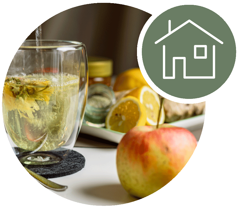 Kombination aus Bild von Fastenernährung (Tee, Apfel, Honig, Zitrone) und Icon (stilisiertes Haus)