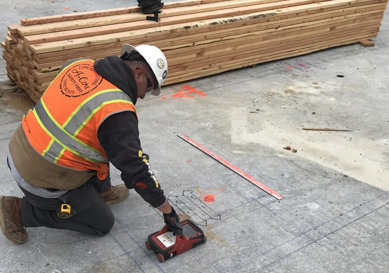 A-Core Worker Doing Concrete Scanning on a Job
