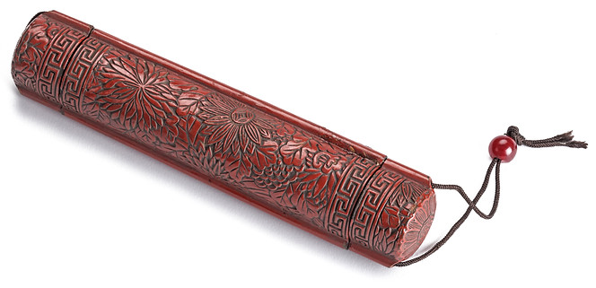 An exceptional Japanese carved red chõshitsu lacquer telescope Edo period, late 18th cen