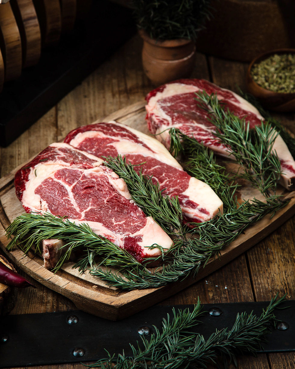 fresh-rib-eye-steaks-table.jpg