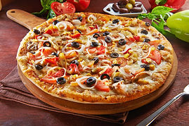 whole-italian-pizza-wooden-table-with-ingredients.jpg