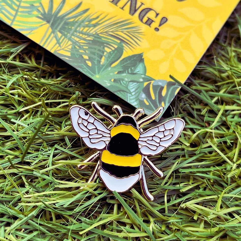 Close up of bee pin badge