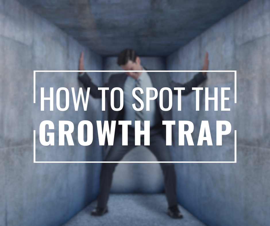 Man in a suit pushing against narrow gray walls, text reads "How to Spot the Growth Trap," creating a confined, stressful mood.
