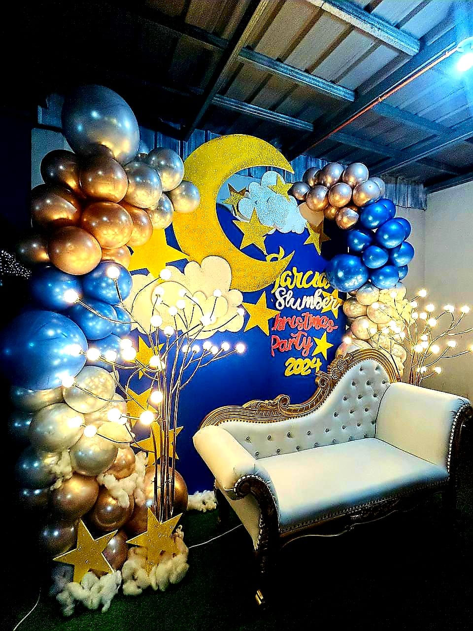 Garcia Slumber Christmas Party 2023: Moon backdrop, balloons, and elegant seating