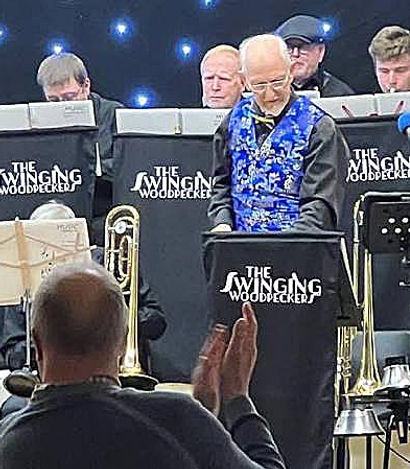 Richard Cluley Swinging Woodpecklers.jpg