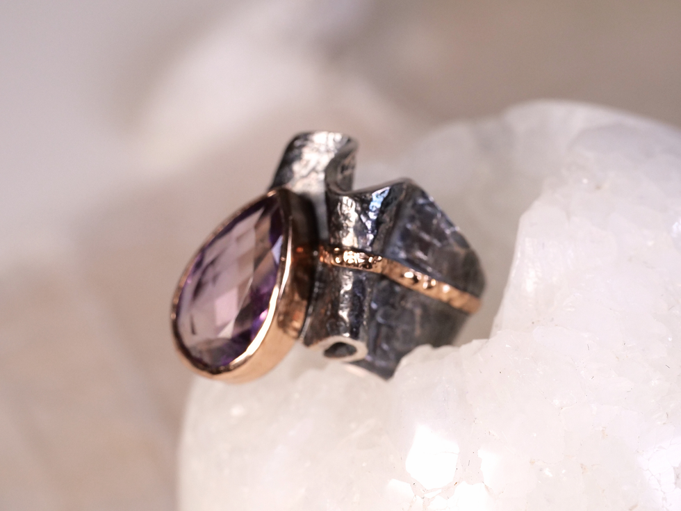 Thumbnail: raised setting, tall bezel, smooth bezel rim, gold rim setting, two tone bezel, metal fold details, asymmetric band, wave