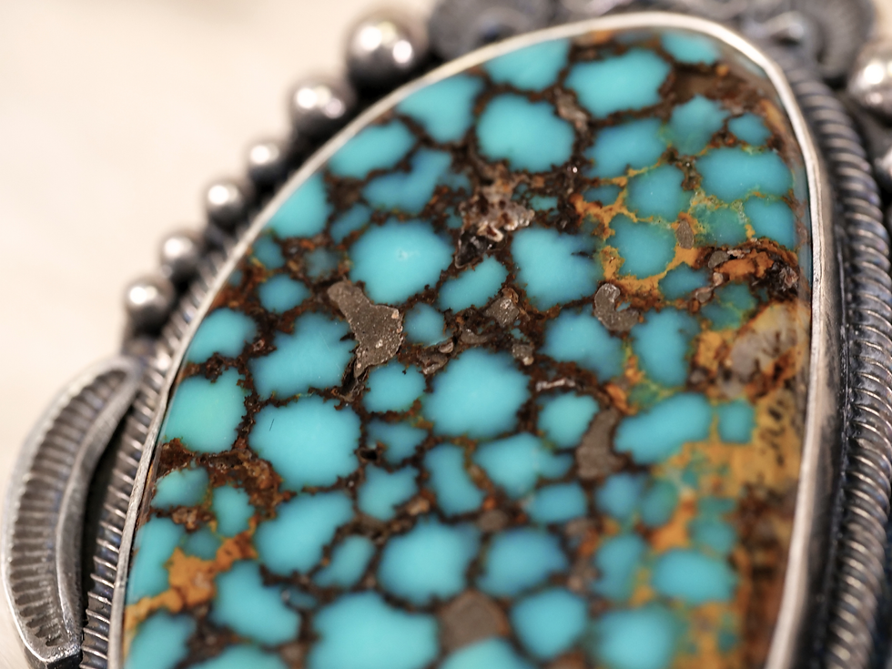 Thumbnail: A stunning turquoise mosaic ring crafted in sterling silver, featuring natural patterns that inspire grounding and protecti