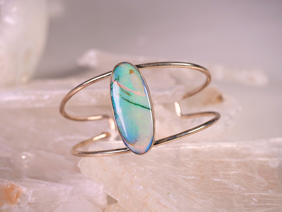 Thumbnail: opal gemstone silver design, opal gemstone handmade cuff, opal gemstone healing energy, opal gemstone spiritual jewelry,