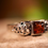 Thumbnail: gemstone filigree, amber jewelry artisan, amber gemstone cherry red, amber gemstone fiery glow, amber gemstone polish jewelry