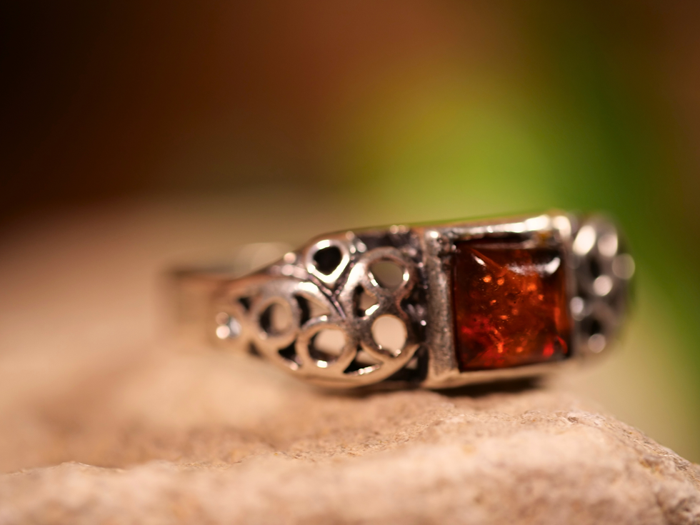 gemstone filigree, amber jewelry artisan, amber gemstone cherry red, amber gemstone fiery glow, amber gemstone polish jewelry