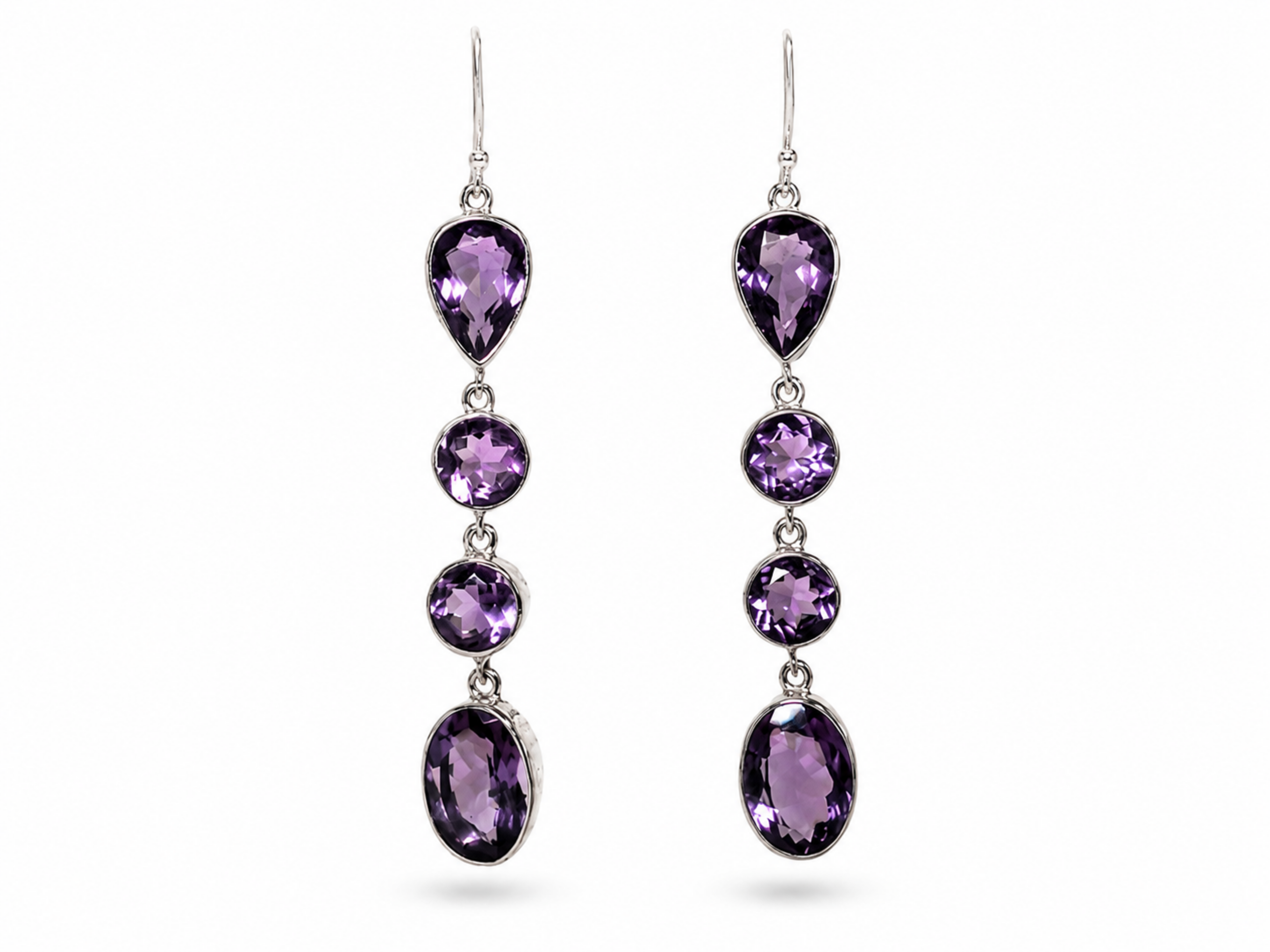 Add a touch of elegance to any outfit with our Long Amethyst Dangle Earrings. These stunning earrings feature a deep purple a