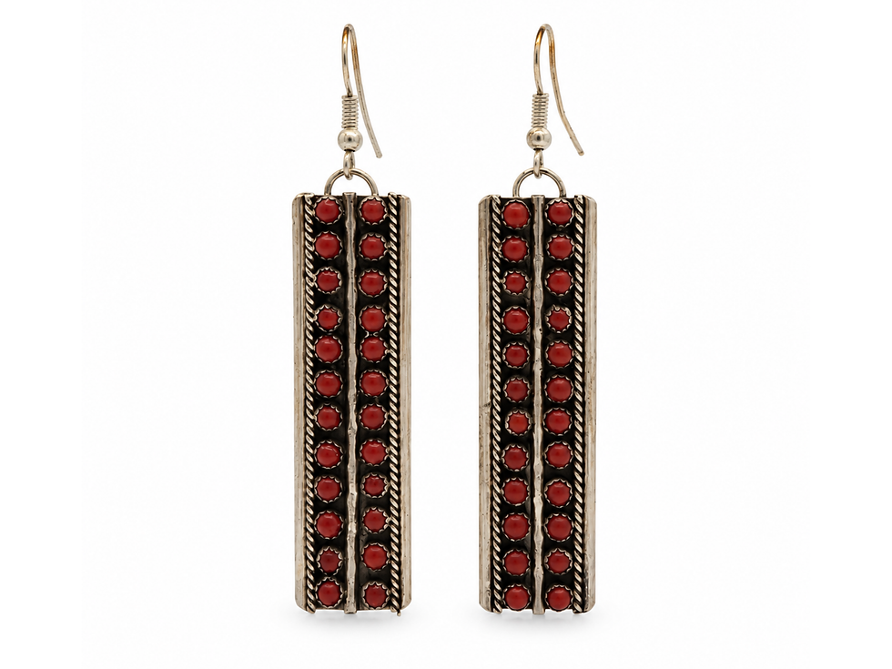 design features two vertical rows of round red cabochons, scalloped settings, and twisted rope borders. Darkened metal