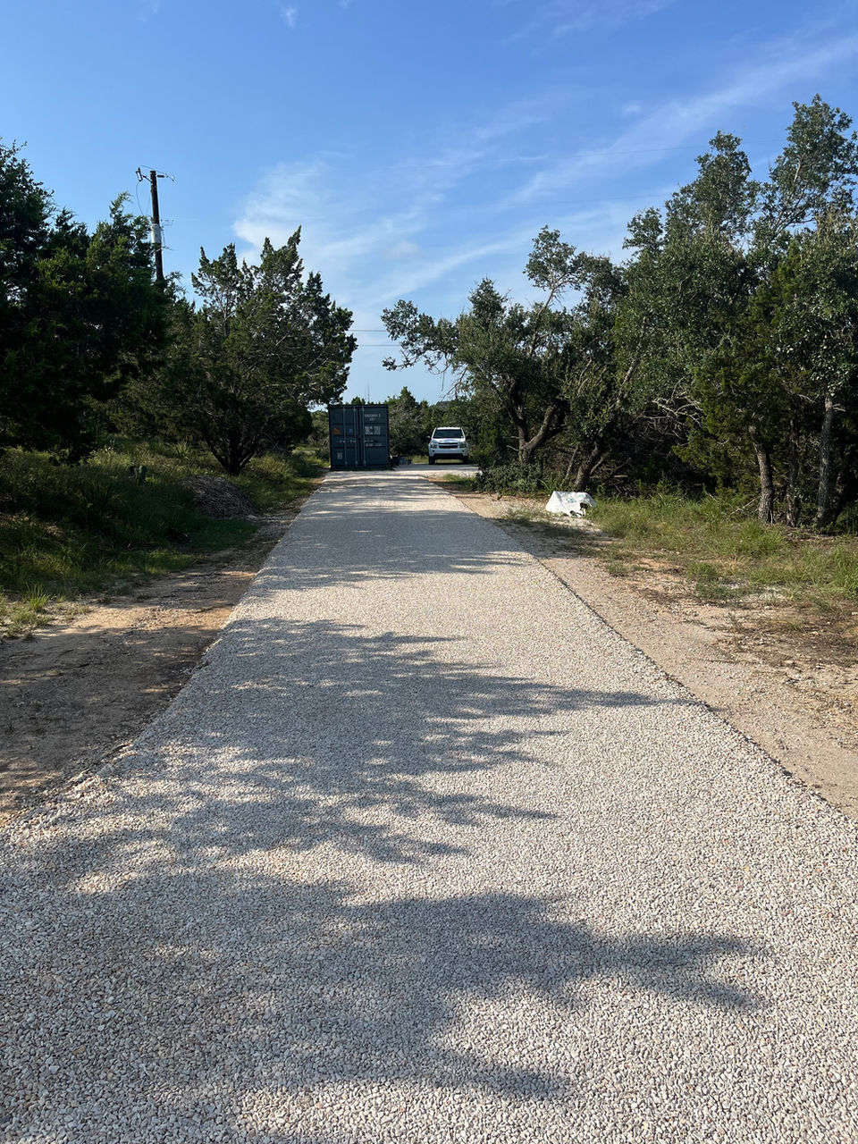 A flat compacted gravel road 