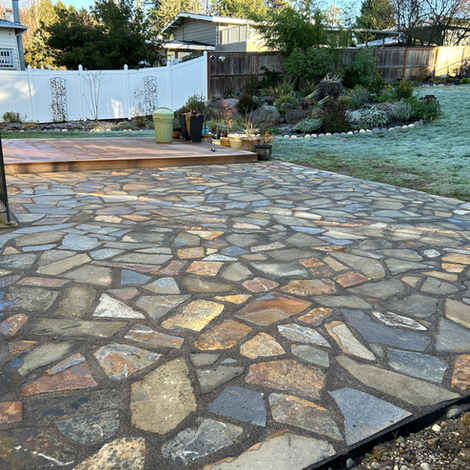 Flagstone patio installation in Kirkland backyard