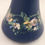 Thumbnail: Weller Hudson Blue And Decorated Tall Bud Vase with Blossom Garlands c1920