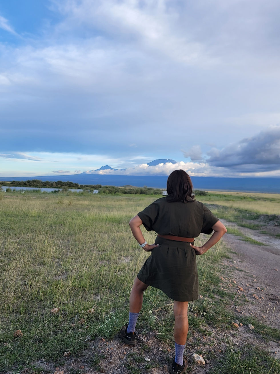standing in awe of mount kili in Amboseli Kenya
