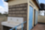 Functional school latrines with dedicated handwashing stations built to improve student hygiene in Kenya.