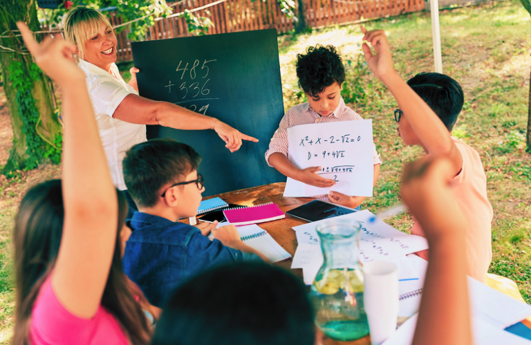 Kids doing math outside during summer