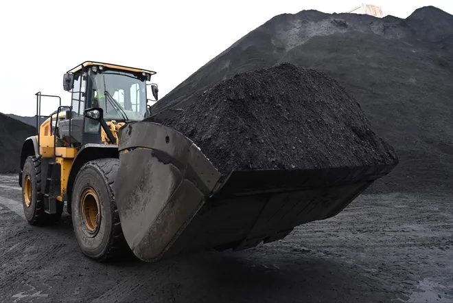 An excavator transporting coal in Eastern France.