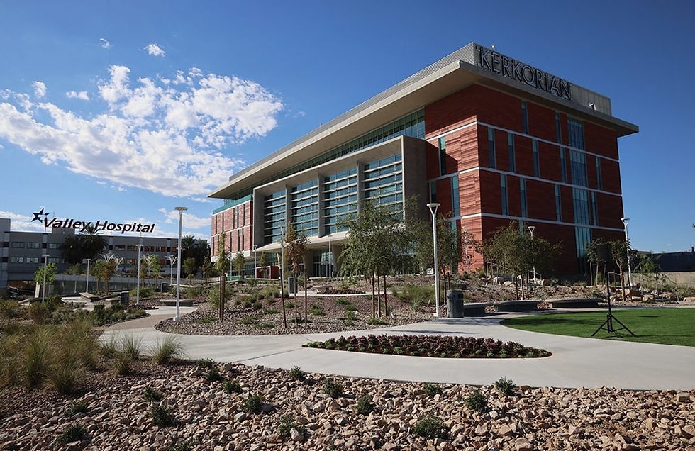 UNLV Kirk Kerkorian School of Medicine building exterior under clear blue sky.