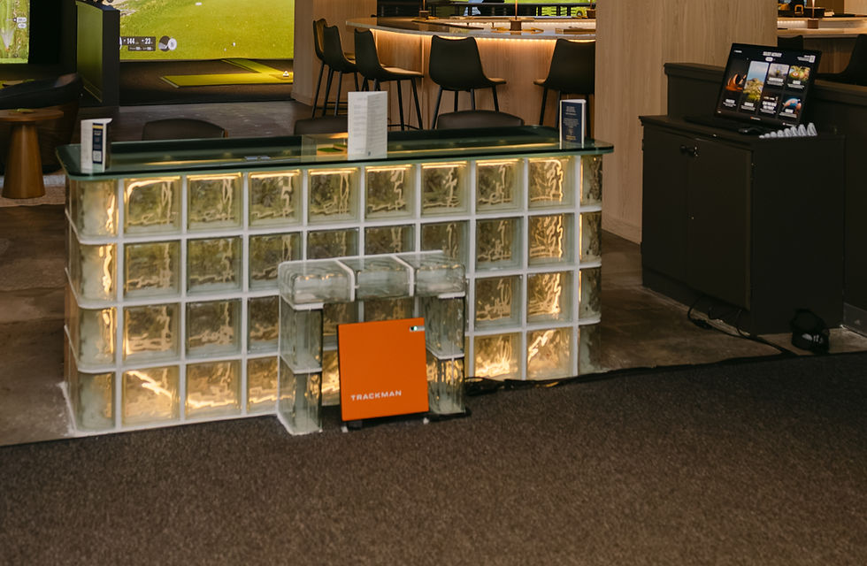 Trackman golf simulator unit at glass block bar, Crossroads Golf KC