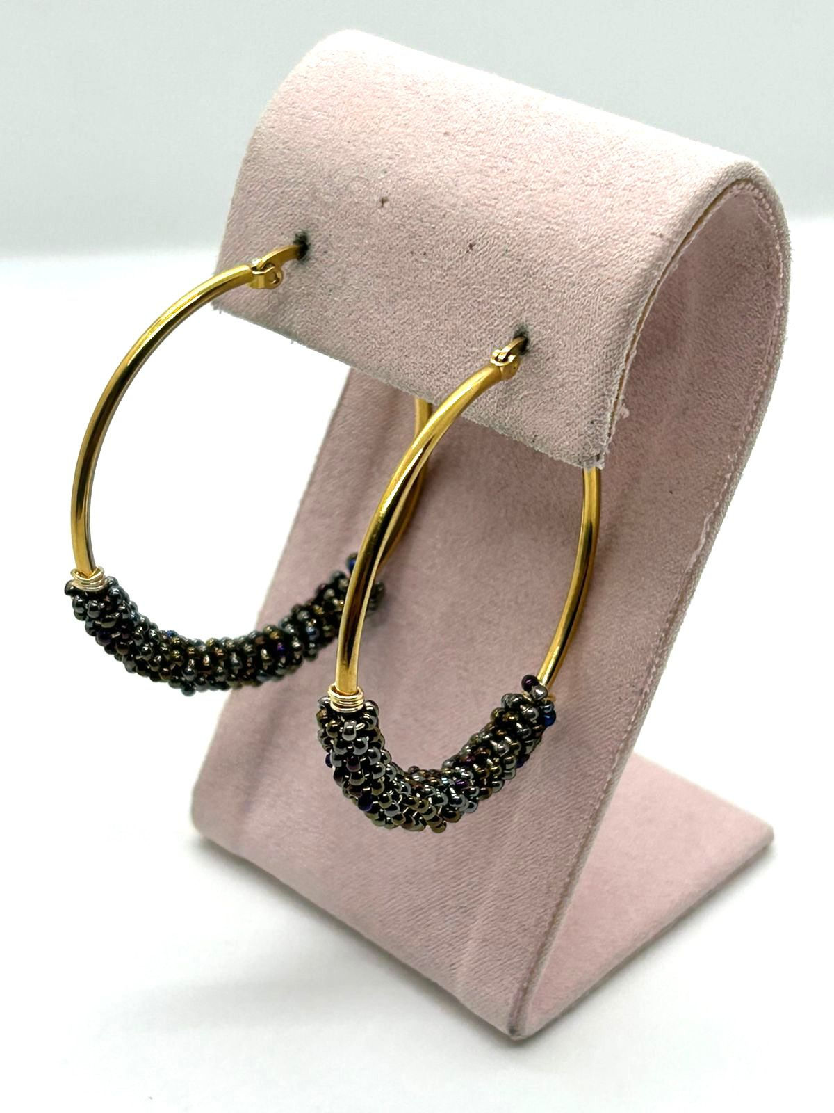 Arracadas grandes con tornasol