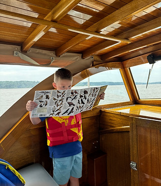 Birding on Tartan kid with map
