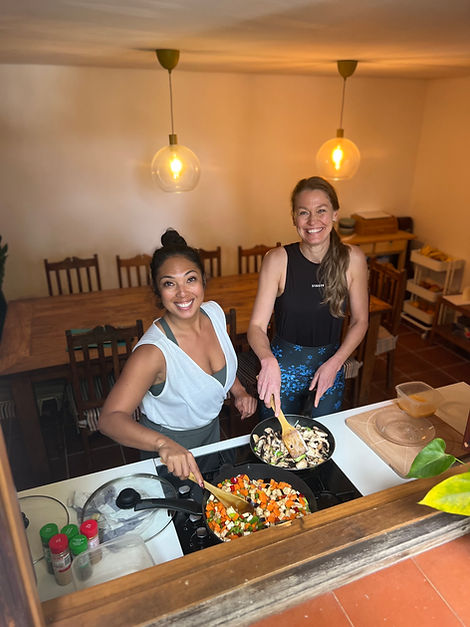 Students cooking together while a yoga teacher training in Tenerife