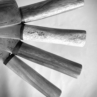 An unloved Gang of Four. Crude, but magnificent, Nakiri's made from blades forged in fire by hand and handles made from wood I collected from a beach after a typhoon. JohnnyBradley.com
