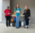 Dr. Henry, summer intern Abby and Liz Brocato at a local Walmart.