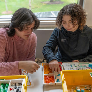 Building community compassion with Lego Robotics