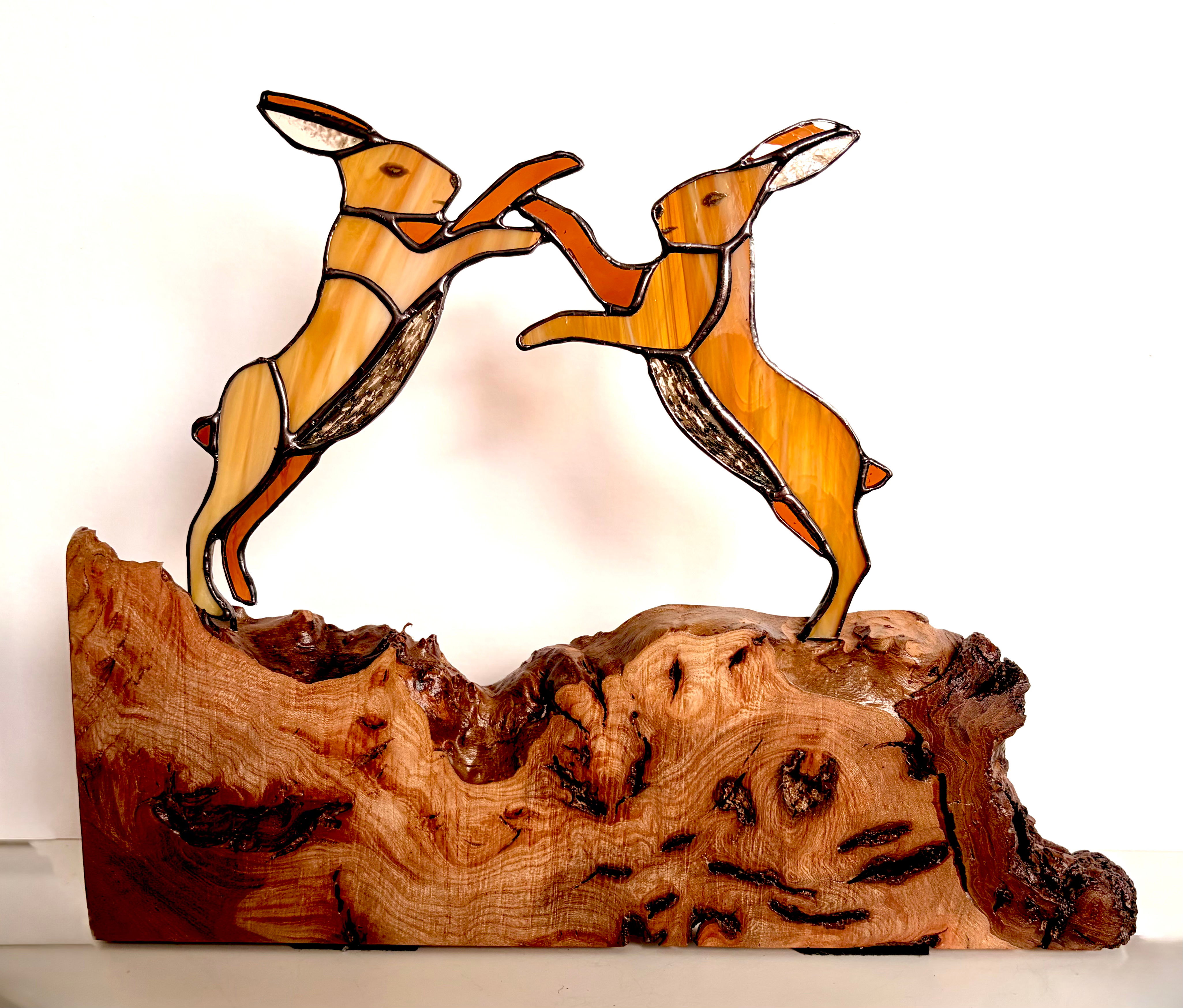 Amber Stained Glass Boxing Hares Sculpture – Handmade Woodland Art on Elm Burr B