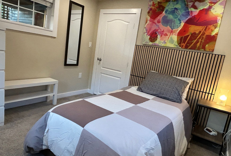 Edgemont Suite Twin bedroom: Cozy and completely furnished twin bedroom with a study desk and closet. Very bright with 3 windows surrounded with only gardens.