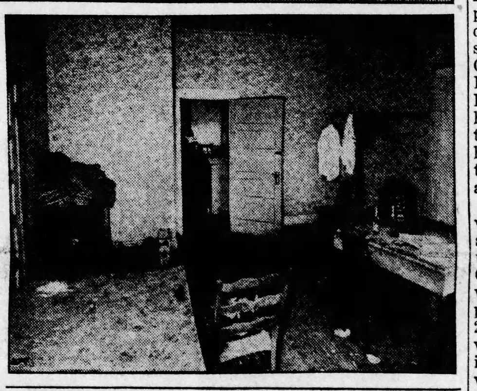 The room where the gunshot occurred.  The camera is looking towards the door to the barroom.  This is the door Joe Armenia was standing in when he shot Smokey Joe and Frank Ferraro. The table to the right is where Frank Ferraro was sitting across from Nick Cecola when Smokey Joe confronted him. Courtesy of Newspapers.com and The Shreveport Times.