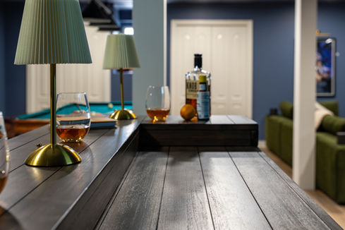 Speakeasy bar with drinks.