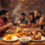afro American family sitting and eating almighty pit bbq for dinner with honey cornbread,