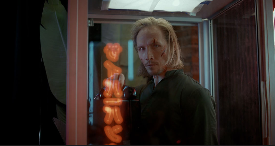 Ethan Daniel Corbett as Atlas in Alenos
