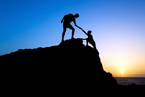 Man and woman climbing moountain .jpeg