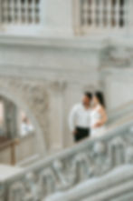 Couple on ornate marble staircase
