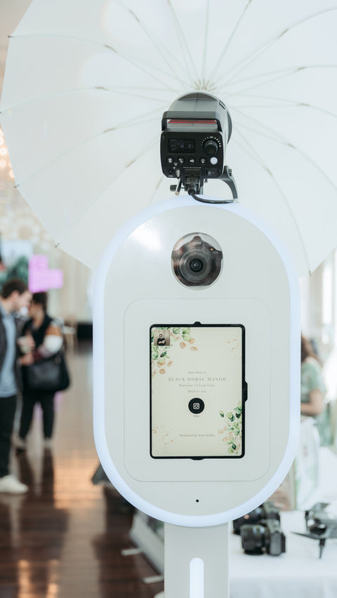 White modern photobooth with umbrella light